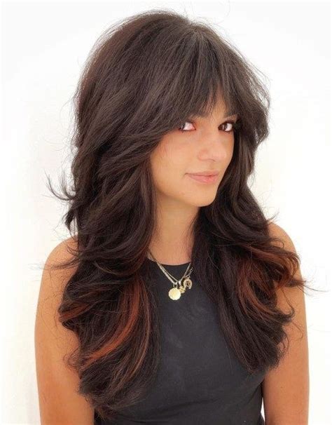 long shaggy hair with cheekbones-skimming bangs|pictures of long layered hair with bangs.